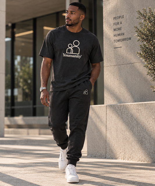 Youmanity™ Standard Tee — Human Essentials, Black, man walking city